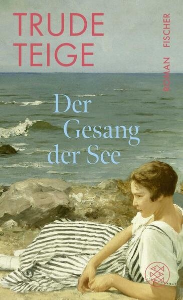 Ein Frau am felsigen Strand liegend bei rauer See.