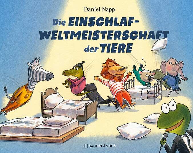 Die Kandidatinnen und Kandidaten legen sich in die Betten während der Frosch moderiert.