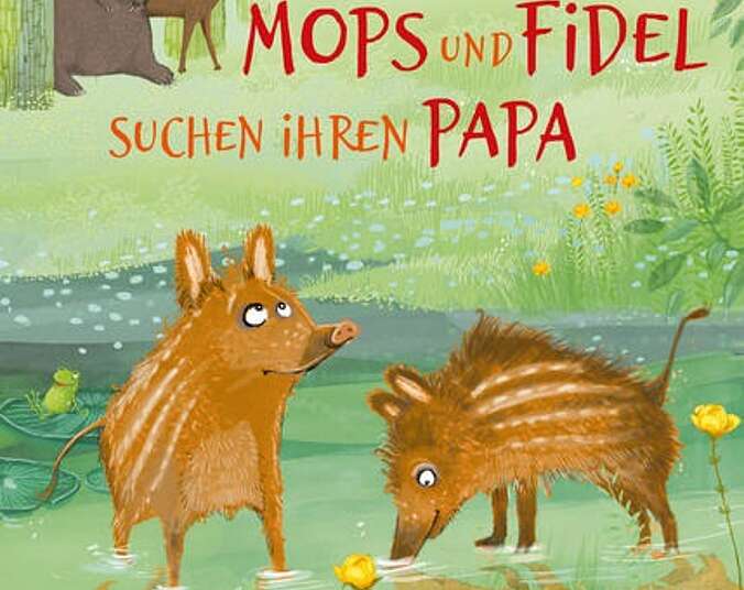Die zwei Frischlinge stehen im Wald.